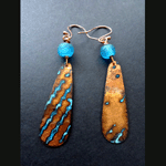 Hand cut hammered patinaed copper with blue bead earrings